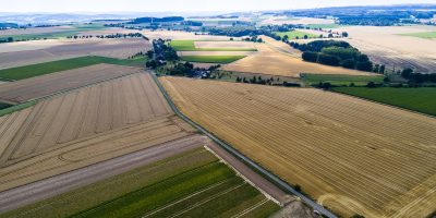aerial-view-of-a-country-side-with-agricultural-VQN26P7-min
