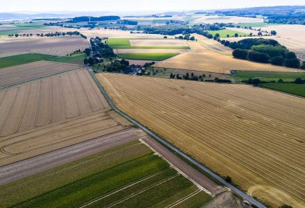 aerial-view-of-a-country-side-with-agricultural-VQN26P7-min